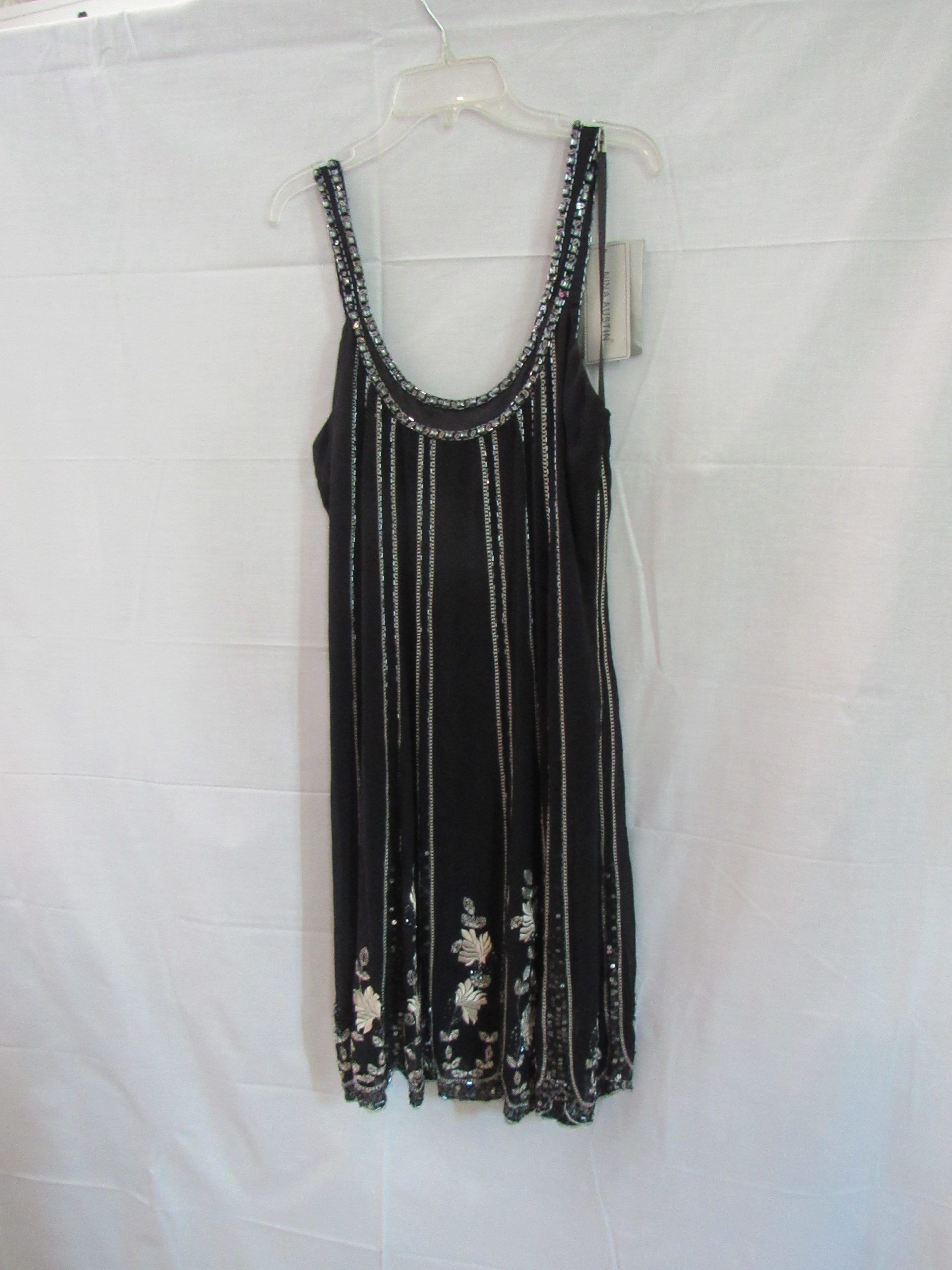 Lote 004 - 600 Vestidos cortos para toda ocasión, pantalones casuales , leggins , tops, sacos chamarras de piel - Imagen 6