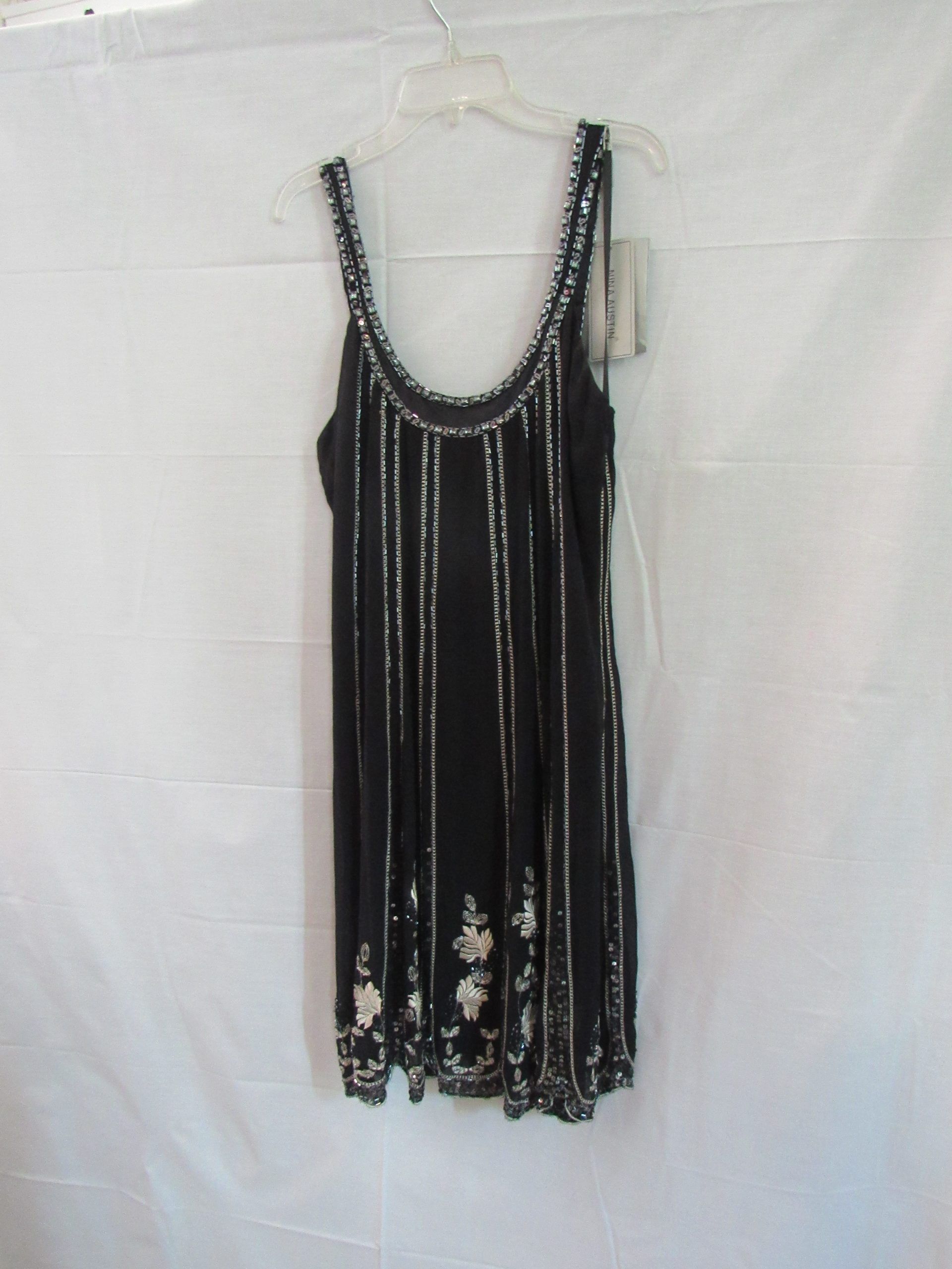 Lote 004 - 600 Vestidos cortos para toda ocasión, pantalones casuales , leggins , tops, sacos chamarras de piel - Imagen 7